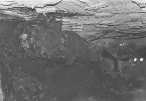 <b>Caption:</b>  Continuous miner in action in the 8th Panel West<br><b>Credit:</b>  Illinois State Geological Survey<br><b>Date:</b>  03/24/1981<br>