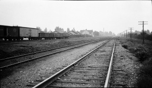 <b>Caption:</b>  IL Central looking North from Madison shaft Divernon--sag in tracks and fill on rightt tracks<br><b>Credit:</b>  Illinois State Geological Survey<br><b>Library No.:</b>  M-1047