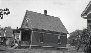 <b>Caption:</b>  Houses in northwest Springfield for which claims were paid by a mining company for damages caused by mining coal 5 feet 9 inches thick at a depth of about 200 feet.<br><b>Credit:</b>  Illinois State Geological Survey<br><b>Date:</b>  Pre-1914<br><b>Publication:</b>  Fig. 44 Cooperative Bulletin 17 – Subsidence in Illinois<br><b>Library No.:</b>  M-1003