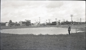 <b>Caption:</b>  Pond caused by subsidence at Westville, Vermilion County, where 6 feet of coal was removed by room-and-pillar mining at a depth of 210 feet. Levels at surface show maximum depth of sag to by 4.7 feet.<br><b>Credit:</b>  Illinois State Geological Survey<br><b>Date:</b>  Pre-1914<br><b>Publication:</b>  Fig. 30 Cooperative Bulletin 17 – Subsidence in Illinois<br><b>Library No.:</b>  M-813