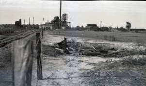 <b>Caption:</b>  Pit hole filled with rubbish at the <!--LINK'" 0:0--> near Danville<br><b>Credit:</b>  Illinois State Geological Survey<br><b>Date:</b>  Pre-1914<br><b>Publication:</b>  Fig. 35 Cooperative Bulletin 17 – Subsidence in Illinois<br><b>Library No.:</b>  M-822
