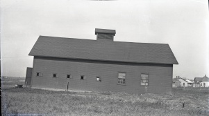 <b>Caption:</b>  Barn of mining company lowered 4 feet at one end [right side]. It has been partially restored.<br><b>Credit:</b>  Illinois State Geological Survey<br><b>Date:</b>  Pre-1914<br><b>Publication:</b>  Fig. 47 Cooperative Bulletin 17 – Subsidence in Illinois<br><b>Library No.:</b>  M-994