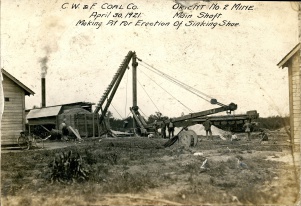 <b>Caption:</b>  Orient No. 2 Mine Main Shaft, Making Pit for Erection of Sinking Shoe<br><b>Credit:</b>  Ledvina Collection<br><b>Date:</b>  April 30, 1921<br>